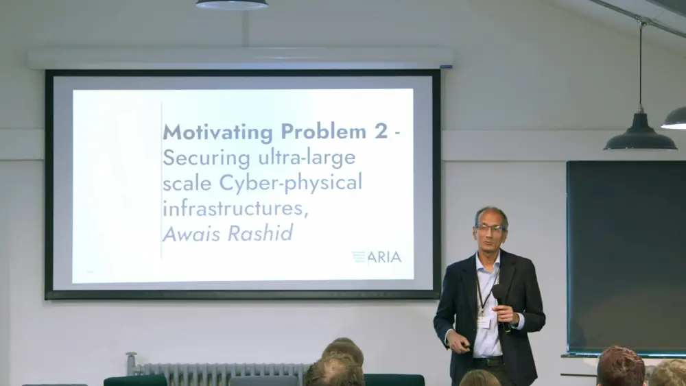 Awais Rashid presenting a talk at the Trust Everything, Everywhere Discovery workshop