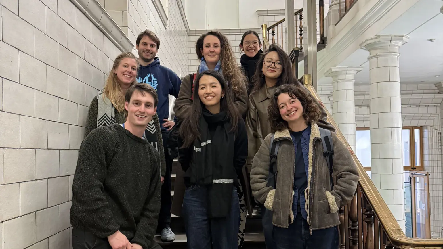Members of the Rethink Matters Innovator Circle posing for a group photo on some stairs