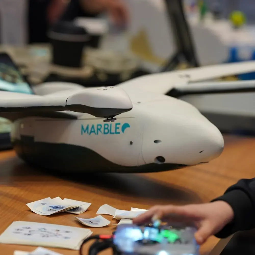 A photo of a white drone developed by Marble as part of the Arctic DronePort project