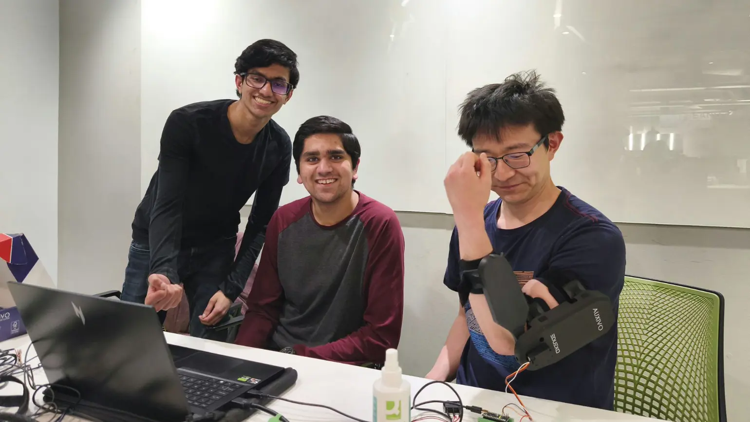 Members of the Hacking Biomechanics Circle working at their desks