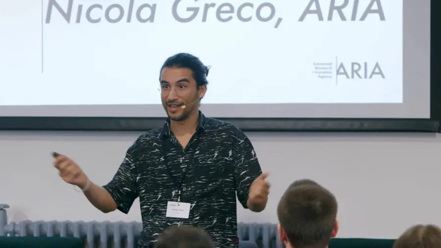 Nicola Greco presenting a talk at the Trust Everything, Everywhere Discovery workshop